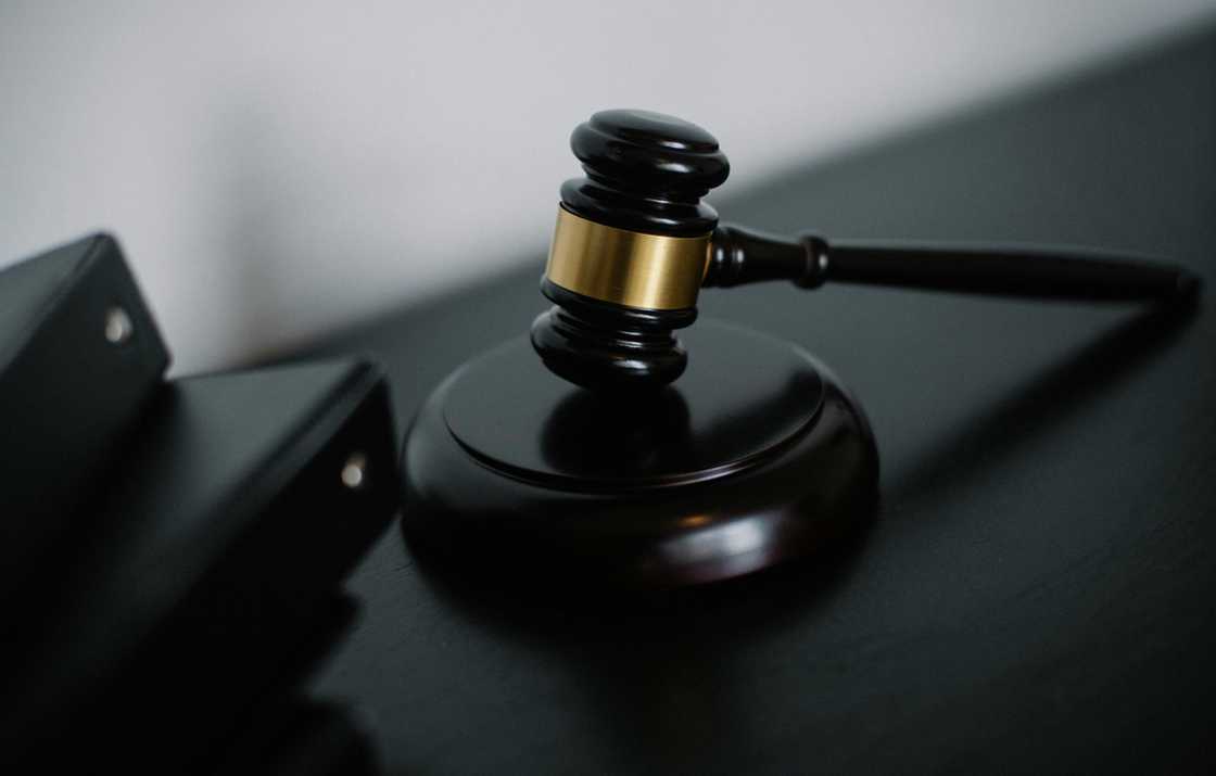 A wooden gavel on a table A wooden gavel on a table