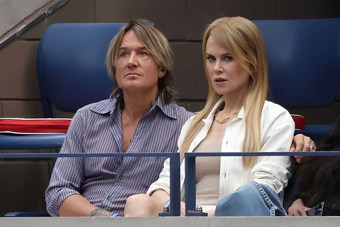 Keith Urban and actress Nicole Kidman watching a tennis match