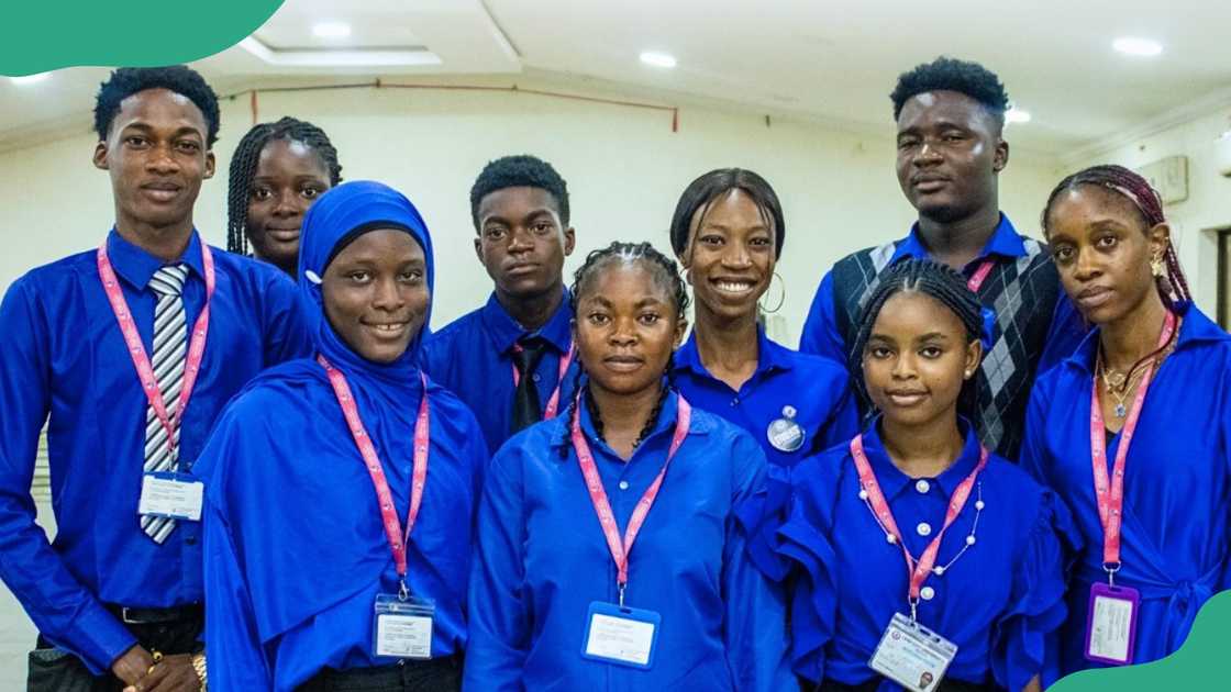 Lead City University students in a blue uniform.
