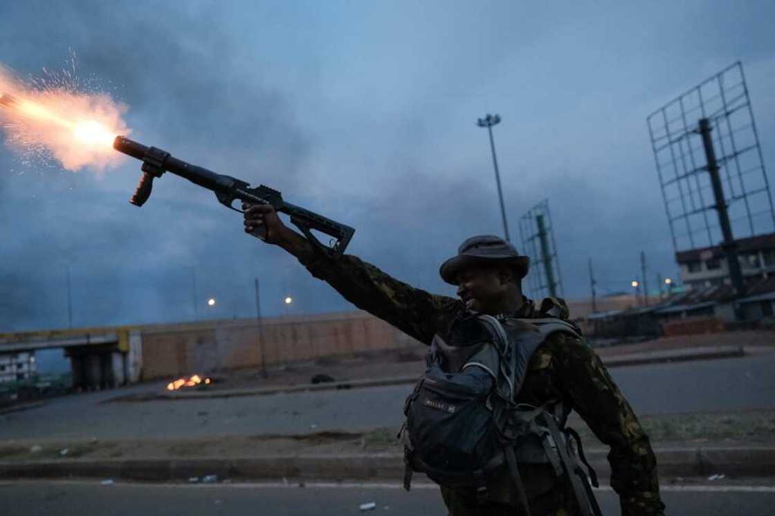 Angry demonstrators alleged vote-rigging as police fired tear gas to disperse them Angry demonstrators alleged vote-rigging as police fired tear gas to disperse them