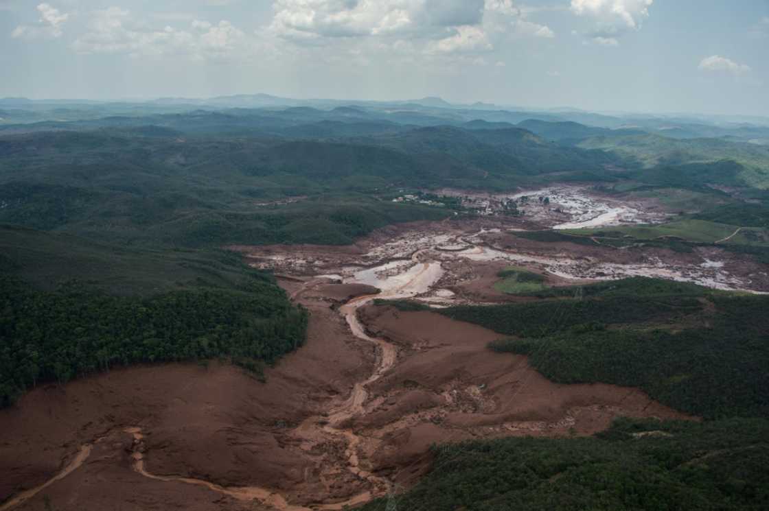 Nineteen people were killed, toxic mine waste sludge flooded 39 towns