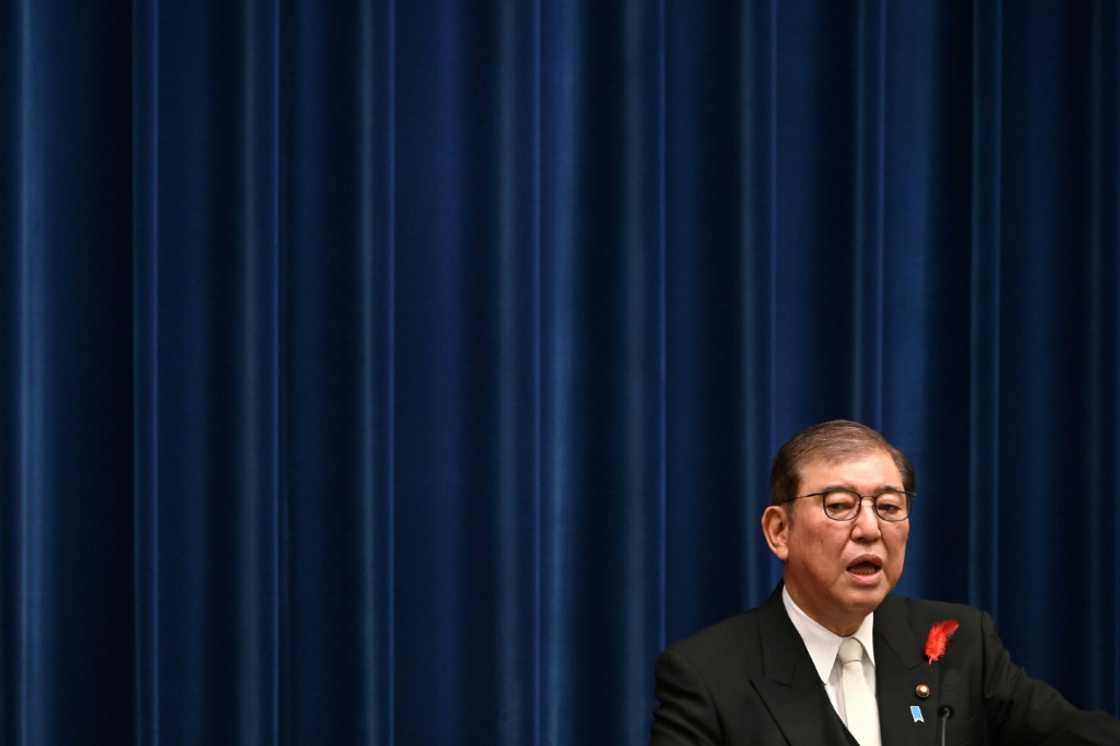 New Japanese Prime Minister Shigeru Ishiba's comments on central bank interest rate hikes sent the yen tumbling, in turn boosting stocks New Japanese Prime Minister Shigeru Ishiba's comments on central bank interest rate hikes sent the yen tumbling, in turn boosting stocks