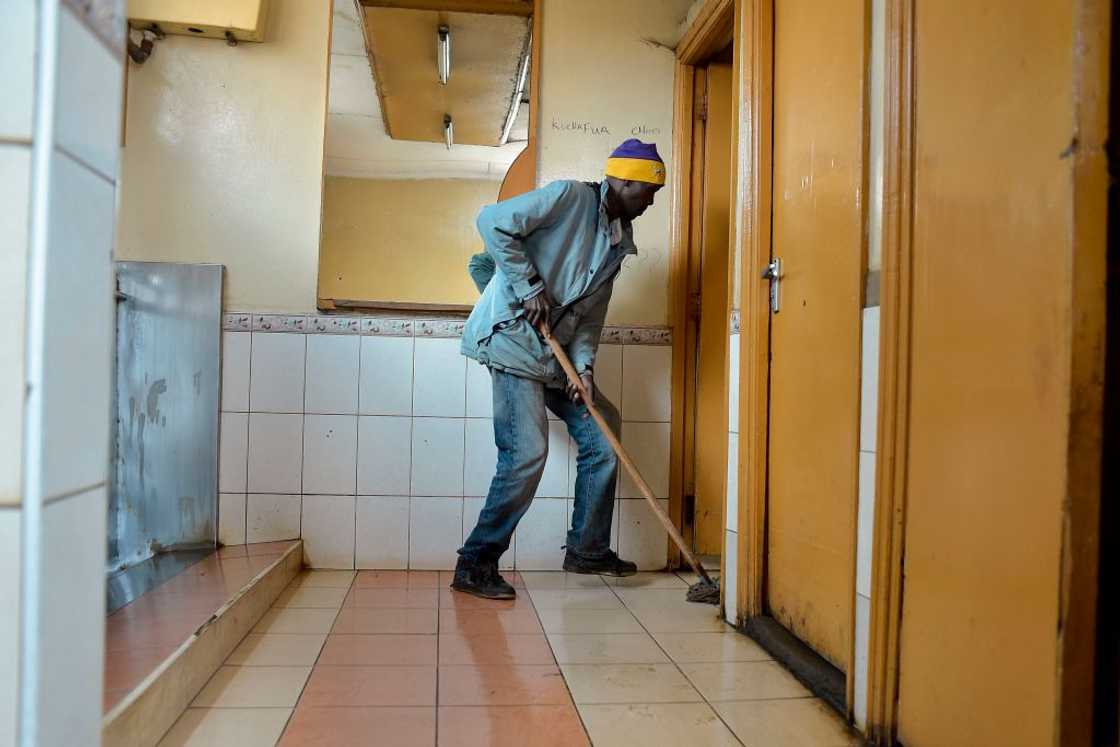 A man works as a janitor.