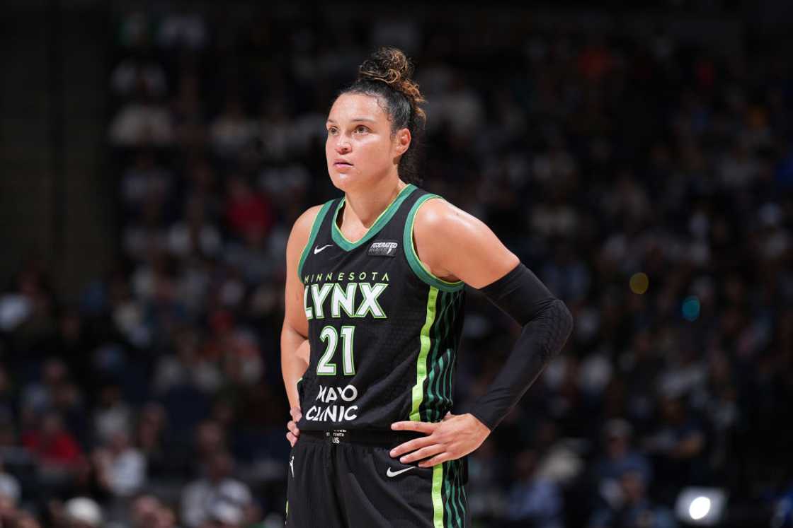 Kayla McBride looks on during the game Kayla McBride looks on during the game