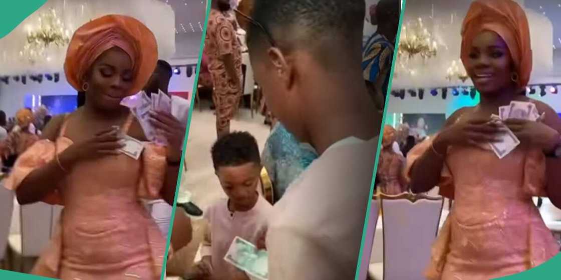 Wizkid's mum's burial party: Bolu sprays money on his mum and Zion. Wizkid's mum's burial party: Bolu sprays money on his mum and Zion.