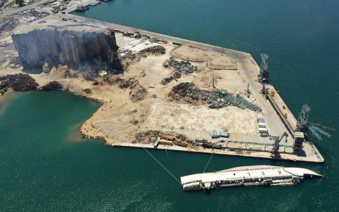 Beirut's blast-hit port, and a capsized ship, seen on July 29, 2022: the explosion destroyed thousands of homes Beirut's blast-hit port, and a capsized ship, seen on July 29, 2022: the explosion destroyed thousands of homes