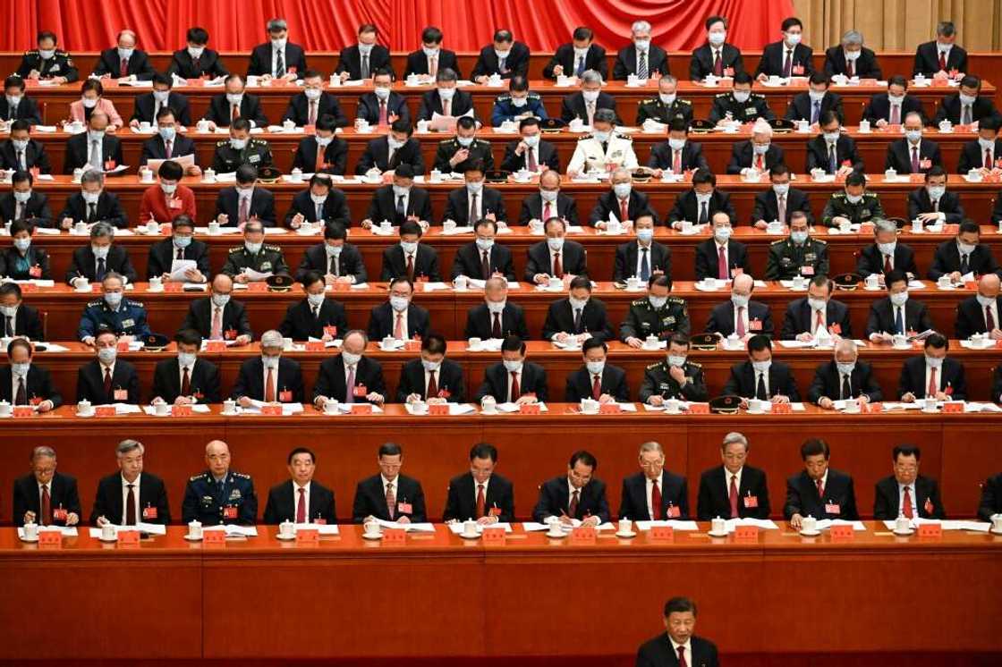 China's President Xi Jinping (front right) speaks during the opening session of the 20th Chinese Communist Party's Congress at the Great Hall of the People in Beijing China's President Xi Jinping (front right) speaks during the opening session of the 20th Chinese Communist Party's Congress at the Great Hall of the People in Beijing