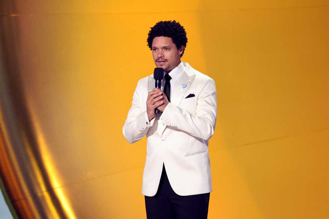 Trevor Noah speaks onstage during the 67th Grammy Awards at Crypto.com Arena Trevor Noah speaks onstage during the 67th Grammy Awards at Crypto.com Arena