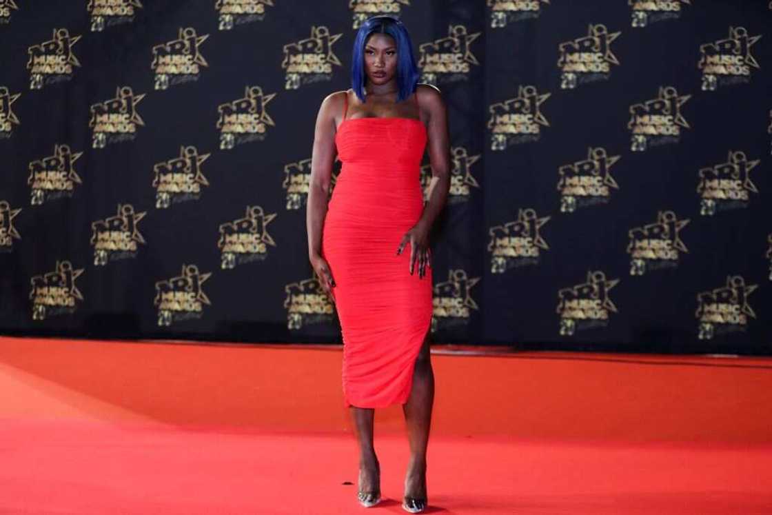 Aya Nakamura pose sur le tapis rouge à son arrivée pour assister à la 20e cérémonie des NRJ Music Awards au Palais des Festivals, à Cannes, le 10 novembre 2018. Photo: Valery HACHE/AFP
Source: Getty Images