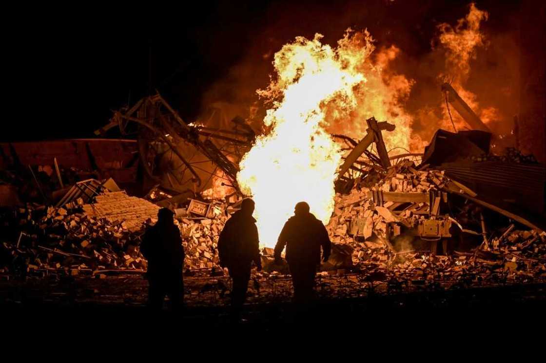 At a railway yard in Kharkiv, fire crews battled a blaze following Russia missile strikes At a railway yard in Kharkiv, fire crews battled a blaze following Russia missile strikes