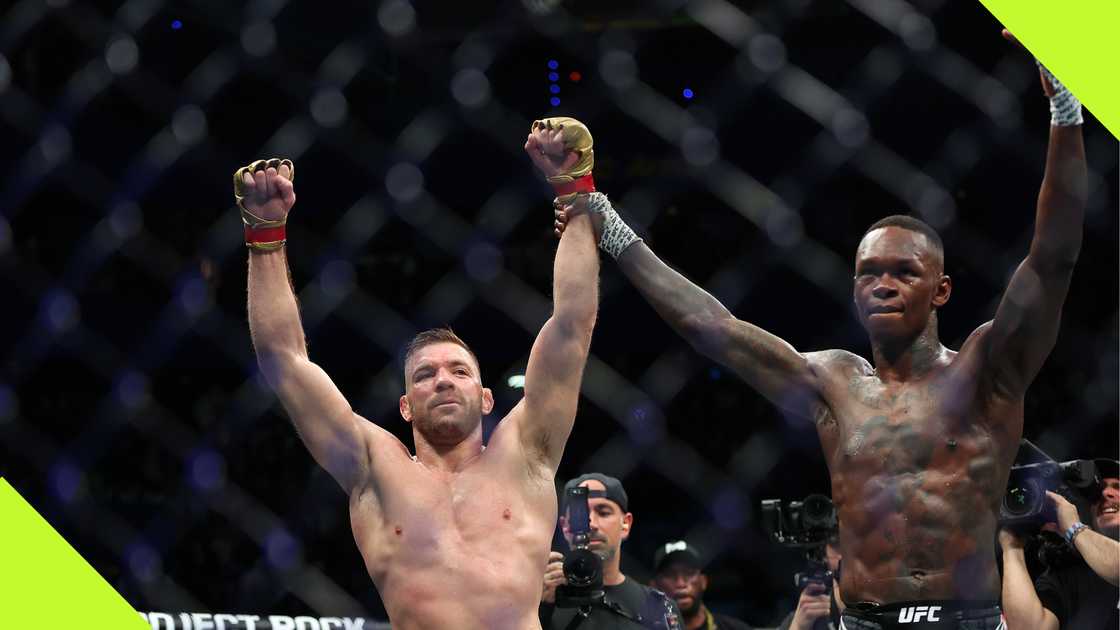 Israel Adesanya shows respect to Dricus du Plessis after their UFC 305 fight.