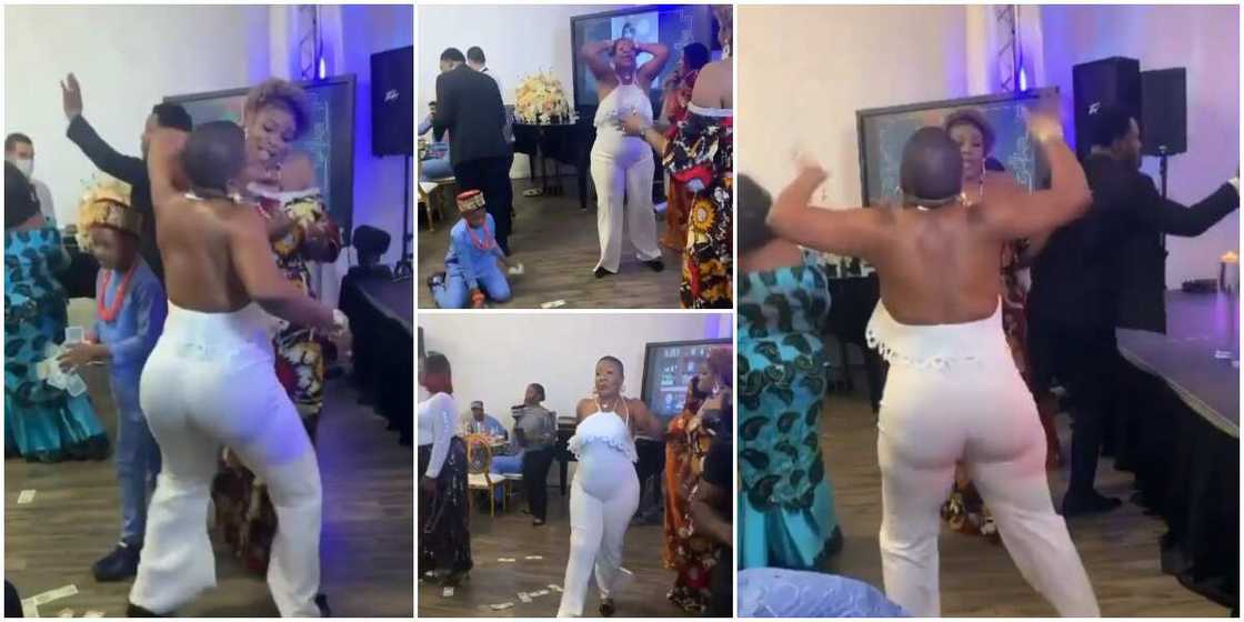 Lady on armless dress thrills guests at birthday party with weird marching dance moves in viral video Lady on armless dress thrills guests at birthday party with weird marching dance moves in viral video