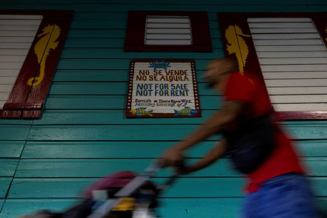 'Not for sale, not for rent,' reads a sign in Cabo Rojo, Puerto Rico, where a planned major development has many residents concerned over rapid gentrification and displacement 'Not for sale, not for rent,' reads a sign in Cabo Rojo, Puerto Rico, where a planned major development has many residents concerned over rapid gentrification and displacement