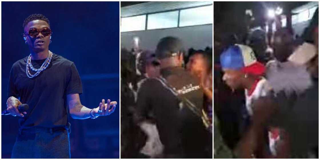 Viral video shows moment stubborn fan pulled Wizkid's shirt and grabbed his eye glasses in Warri Viral video shows moment stubborn fan pulled Wizkid's shirt and grabbed his eye glasses in Warri