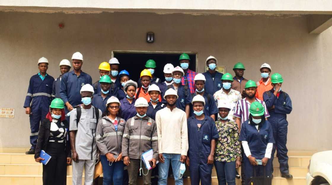 Engineering students pose for a photo in front of the admin block Engineering students pose for a photo in front of the admin block