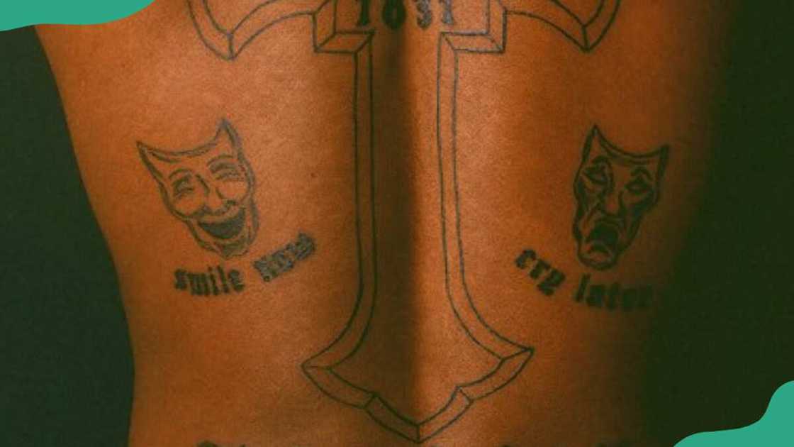 ‘SMILE NOW’ AND ‘CRY LATER’ tattoo ‘SMILE NOW’ AND ‘CRY LATER’ tattoo