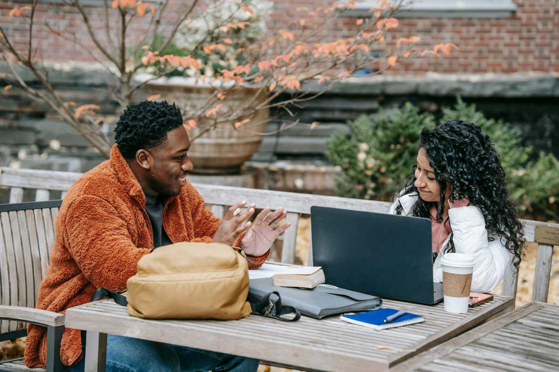 A man and a woman talking
