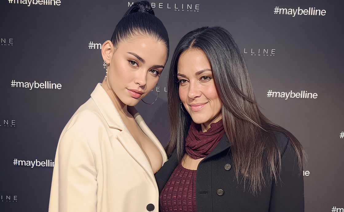 Madison Beer (L) and her mother, Tracie Beer (L) pose on the red carpet of a Maybeline event.