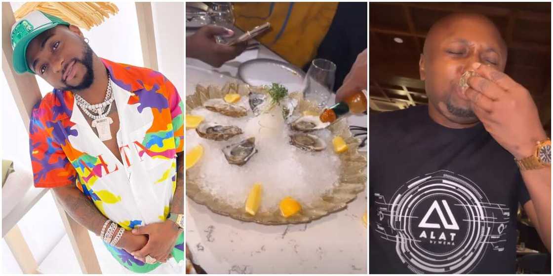 Davido teaches Isreal how to eat oysters in video Davido teaches Isreal how to eat oysters in video