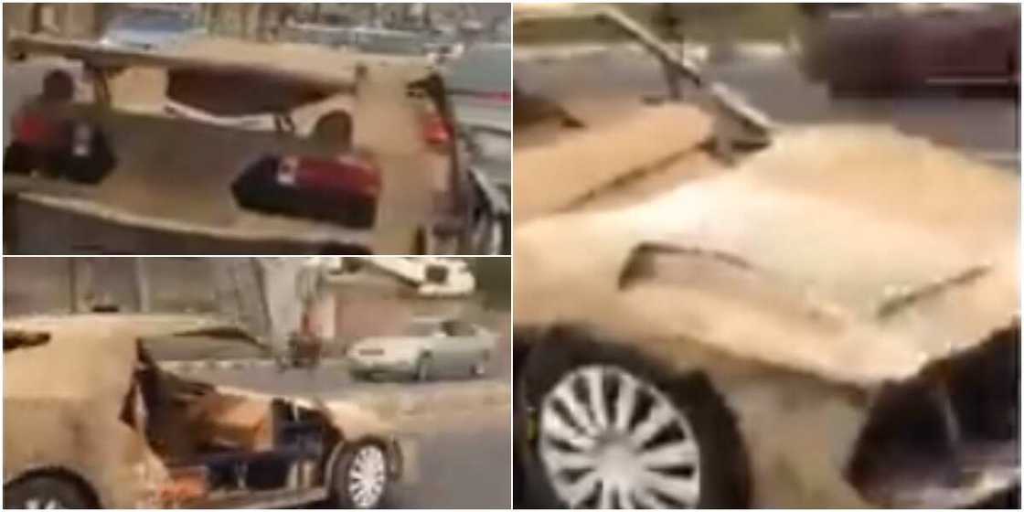 Nigerian man constructs sport car with condemned iron and carton, cruise around town with it Nigerian man constructs sport car with condemned iron and carton, cruise around town with it
