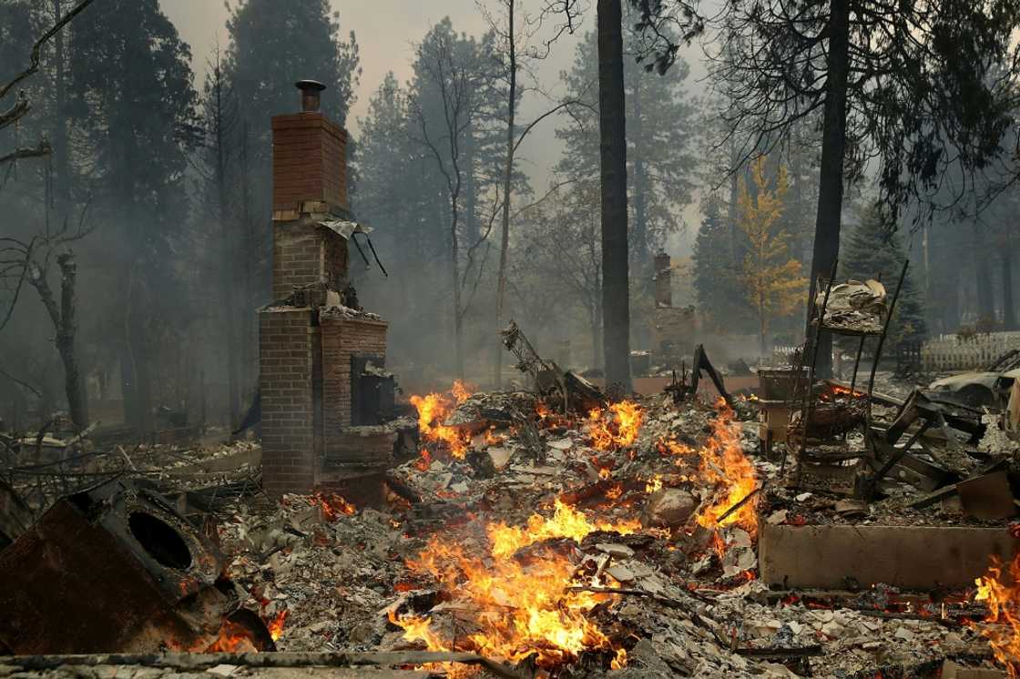 A chimney remains at the site of a home that burned as the Camp Fire moves through the area on November 8, 2018 in Paradise, California A chimney remains at the site of a home that burned as the Camp Fire moves through the area on November 8, 2018 in Paradise, California
