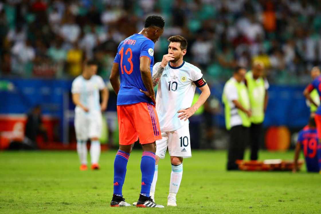 Yerry Mina and Messi. Yerry Mina and Messi.