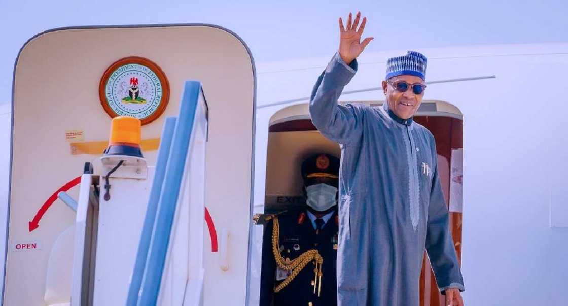 Buhari waving