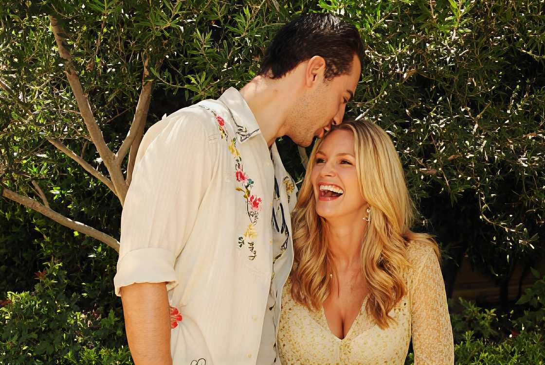 Darius Campbell kisses Natasha Henstridge on the forehead