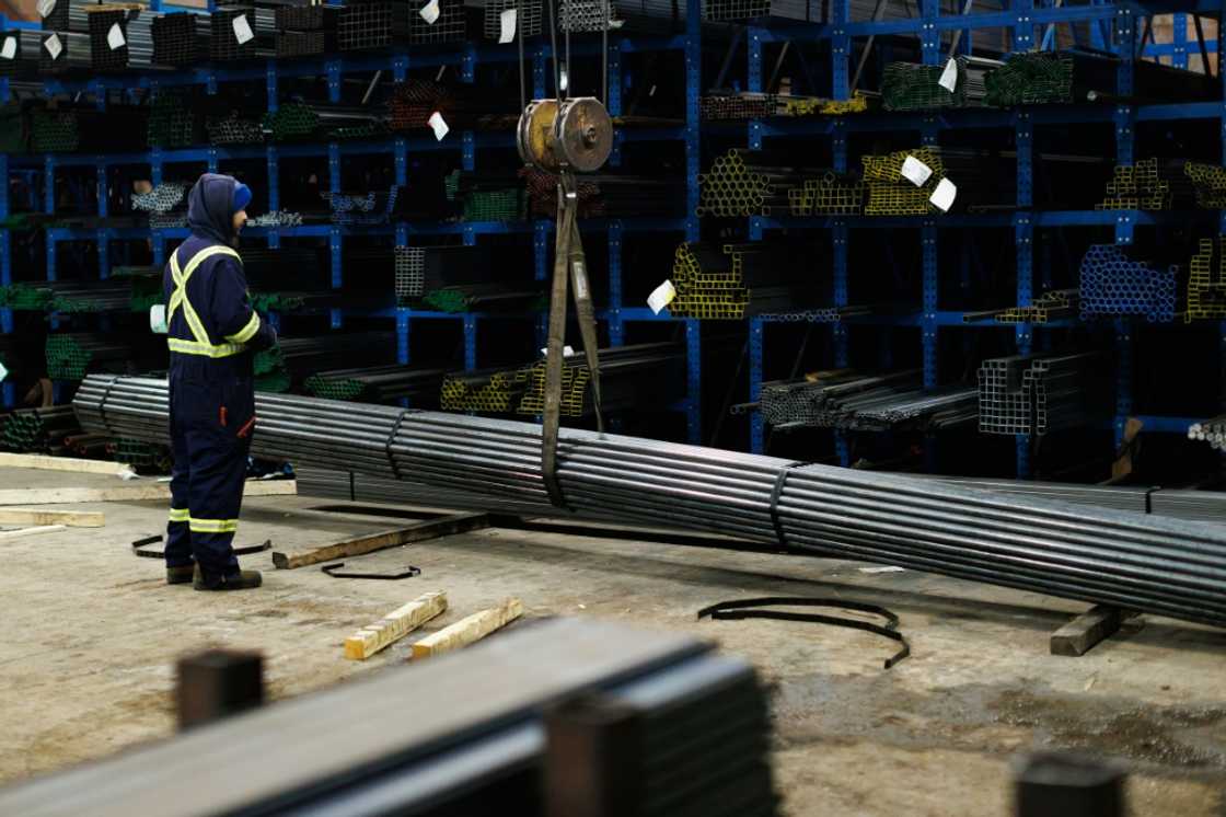 A worker moves steel product at North York Iron, a supplier in Toronto, where people have expressed concern over US President Donald Trump's plans to slap import tariffs on Canadian steel A worker moves steel product at North York Iron, a supplier in Toronto, where people have expressed concern over US President Donald Trump's plans to slap import tariffs on Canadian steel