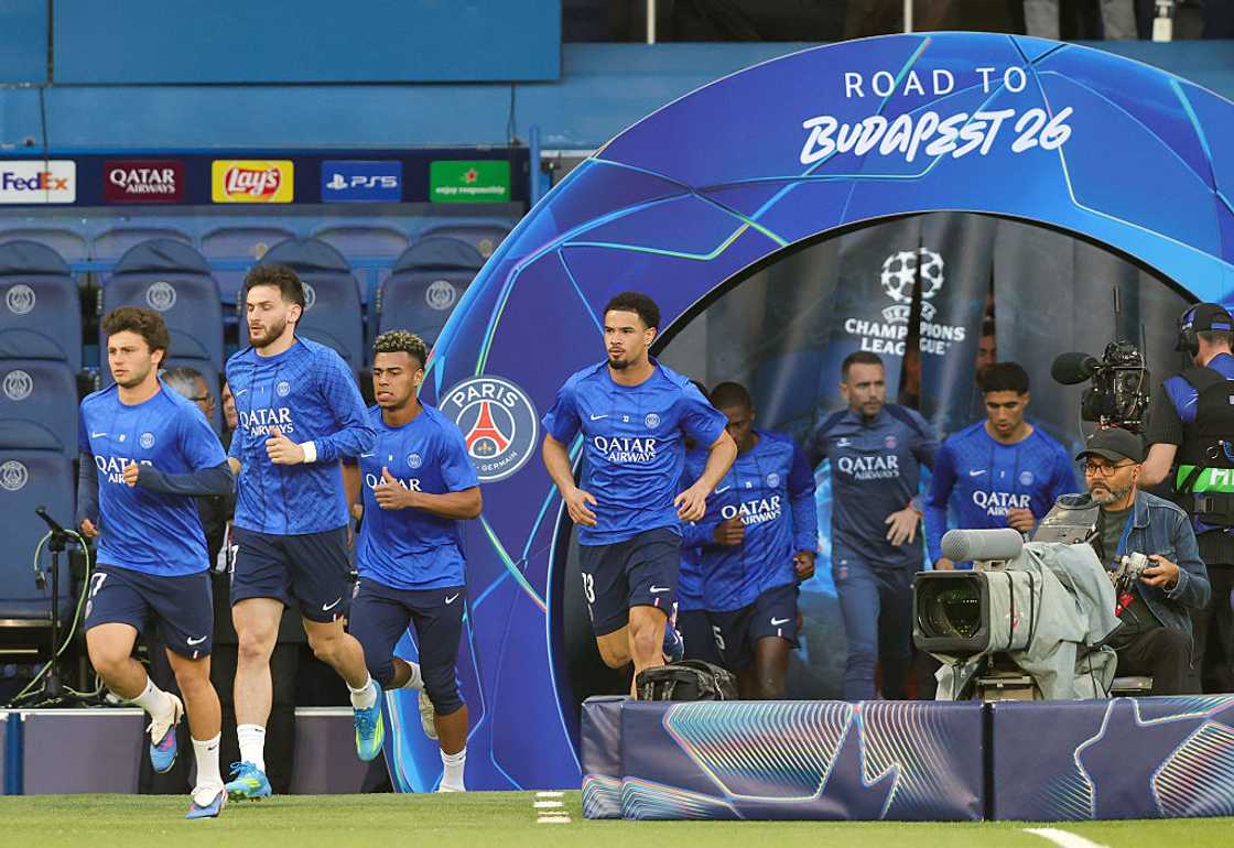 Desire Doue of Paris Saint-Germain and teammates running into the stadium Desire Doue of Paris Saint-Germain and teammates running into the stadium