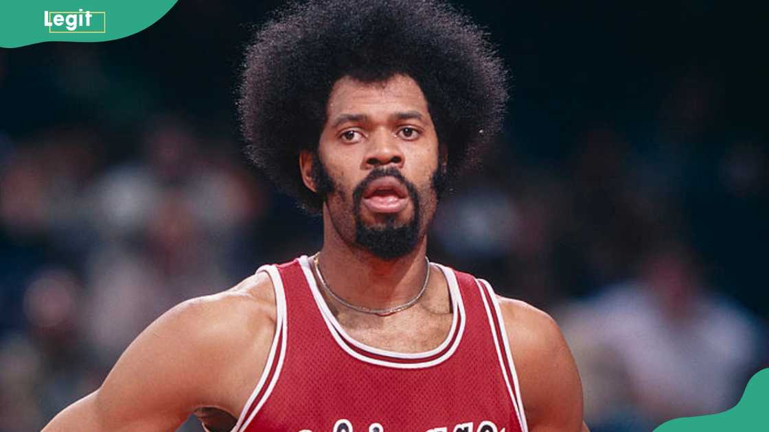 Artis Gilmore stands on the court during a game circa