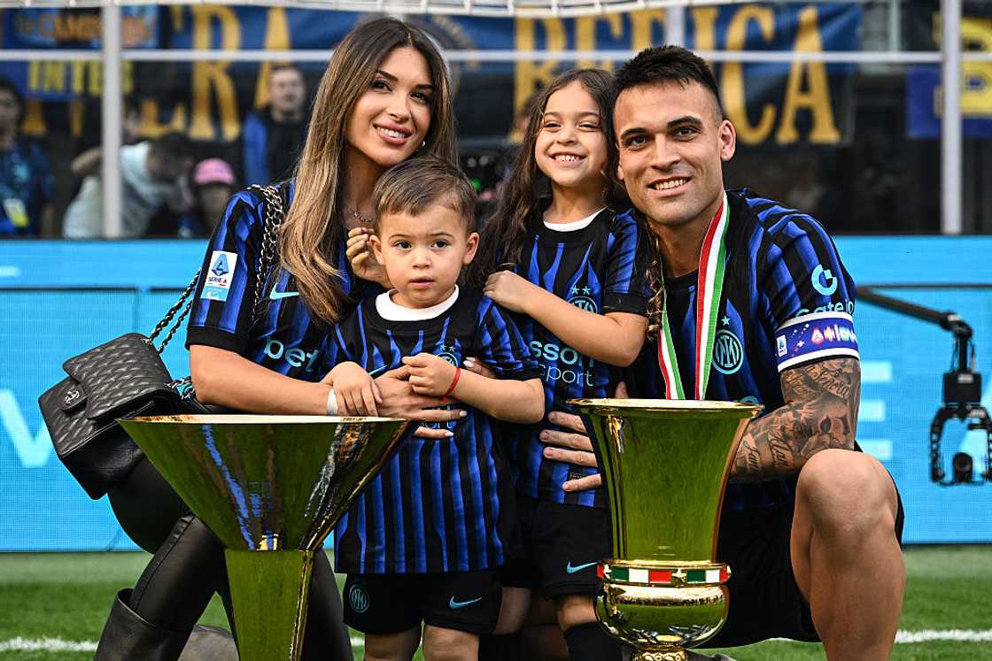 Lautaro Martinez, Agustina Gandolfo and their children at Giuseppe Meazza Stadium