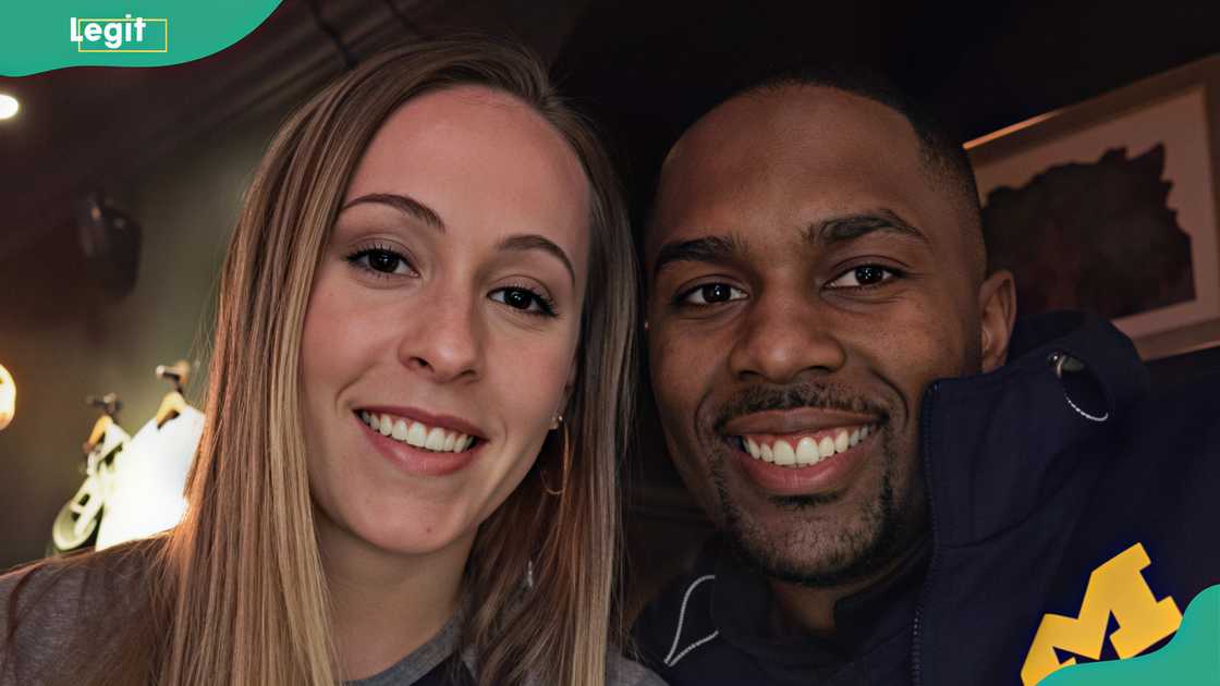 Sherrone Moore and his wife, Kelli Moore, during a casual outing Sherrone Moore and his wife, Kelli Moore, during a casual outing