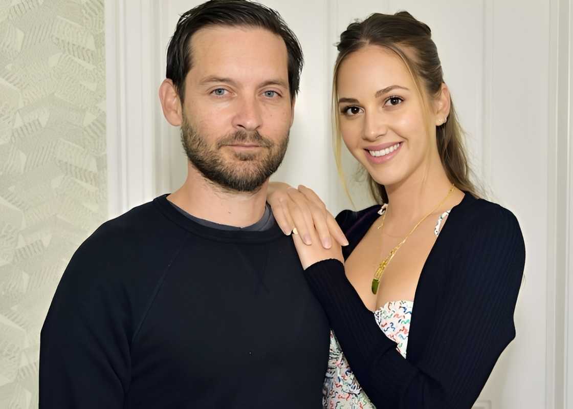 Tobey Maguire with model Tatiana Dieteman. Tobey Maguire with model Tatiana Dieteman.