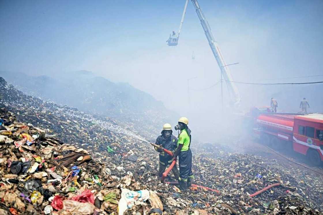 The world's landfills, like this one in Chennai, India, are a major source of planet-warming emissions