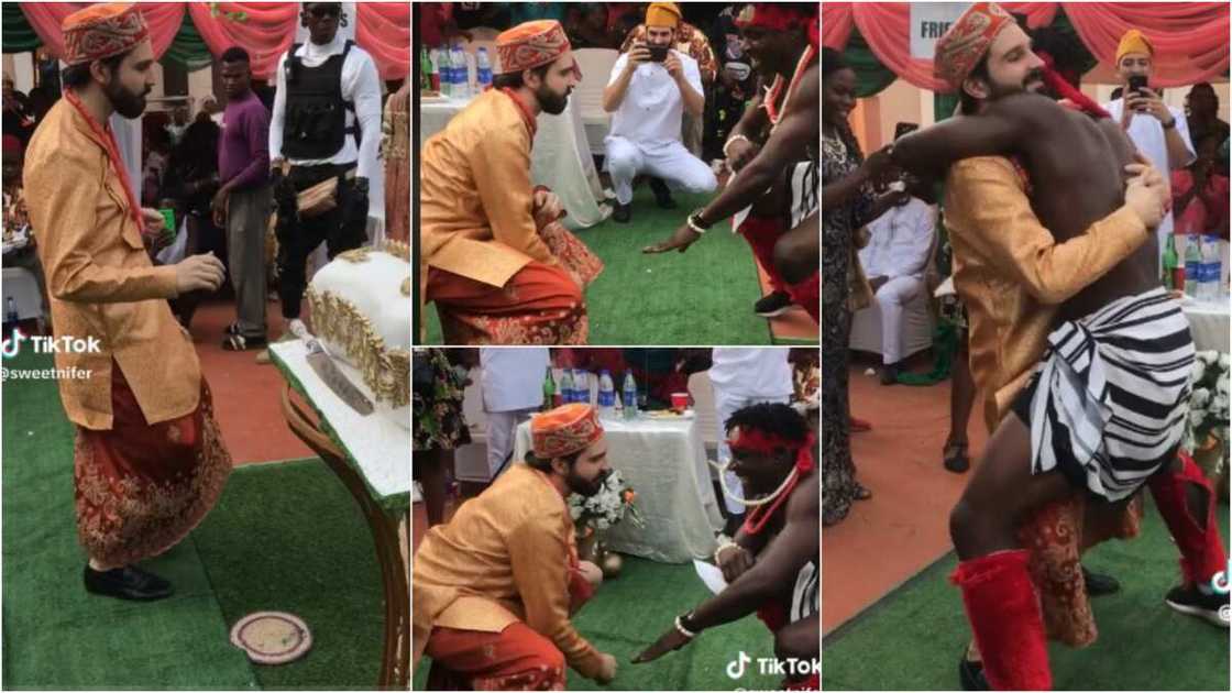 White man dances with cultural dancers White man dances with cultural dancers