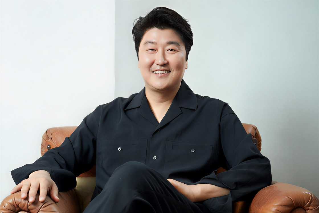 Song Kang-ho poses sitting