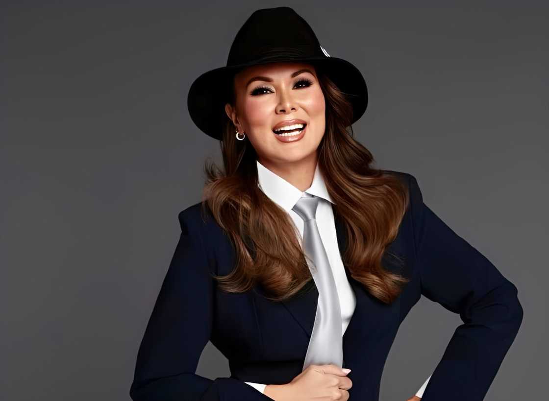 Tiffany Hendra poses against a grey background Tiffany Hendra poses against a grey background