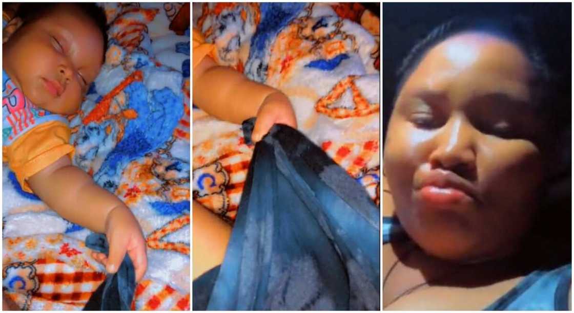 Photos of a baby holding his mother's cloth tightly while sleeping. Photos of a baby holding his mother's cloth tightly while sleeping.