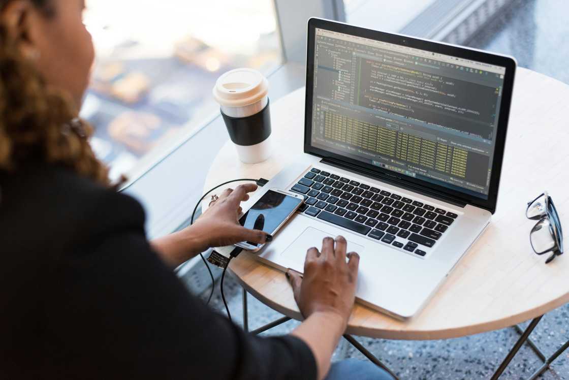 A woman working on a laptop A woman working on a laptop