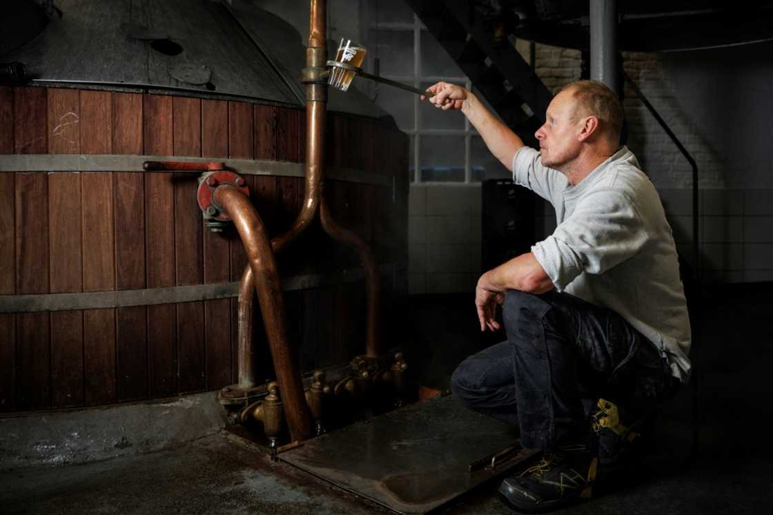 Brewer Jean-Pierre Van Roy checking the production at Brasserie Cantillon