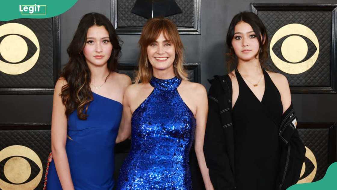Sawyer Chung, Diane Farr, and Coco Chung during the 65th Grammy Awards Sawyer Chung, Diane Farr, and Coco Chung during the 65th Grammy Awards
