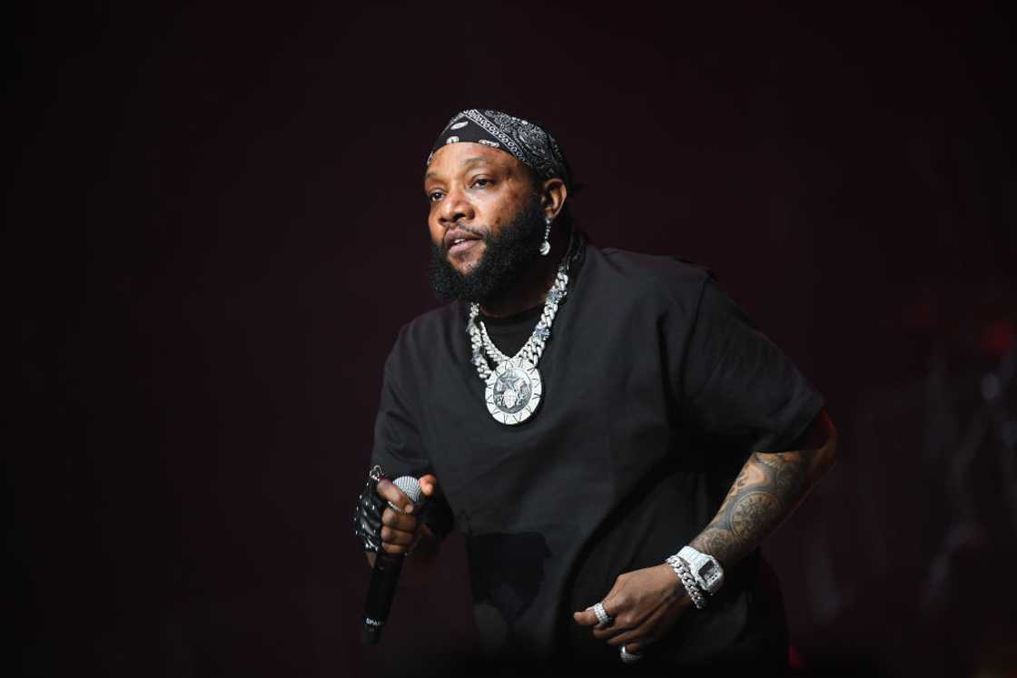 Kcee performs onstage during Davido & Friends Birthday Concert at State Farm Arena in Atlanta Kcee performs onstage during Davido & Friends Birthday Concert at State Farm Arena in Atlanta