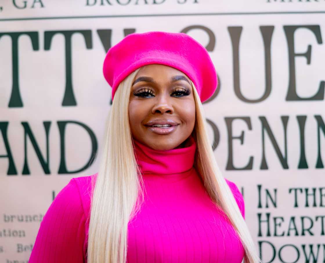 Phaedra Parks in a pink outfit as she attended Betty Sue's Grand Opening at Betty Sue's in Five Points Plaza