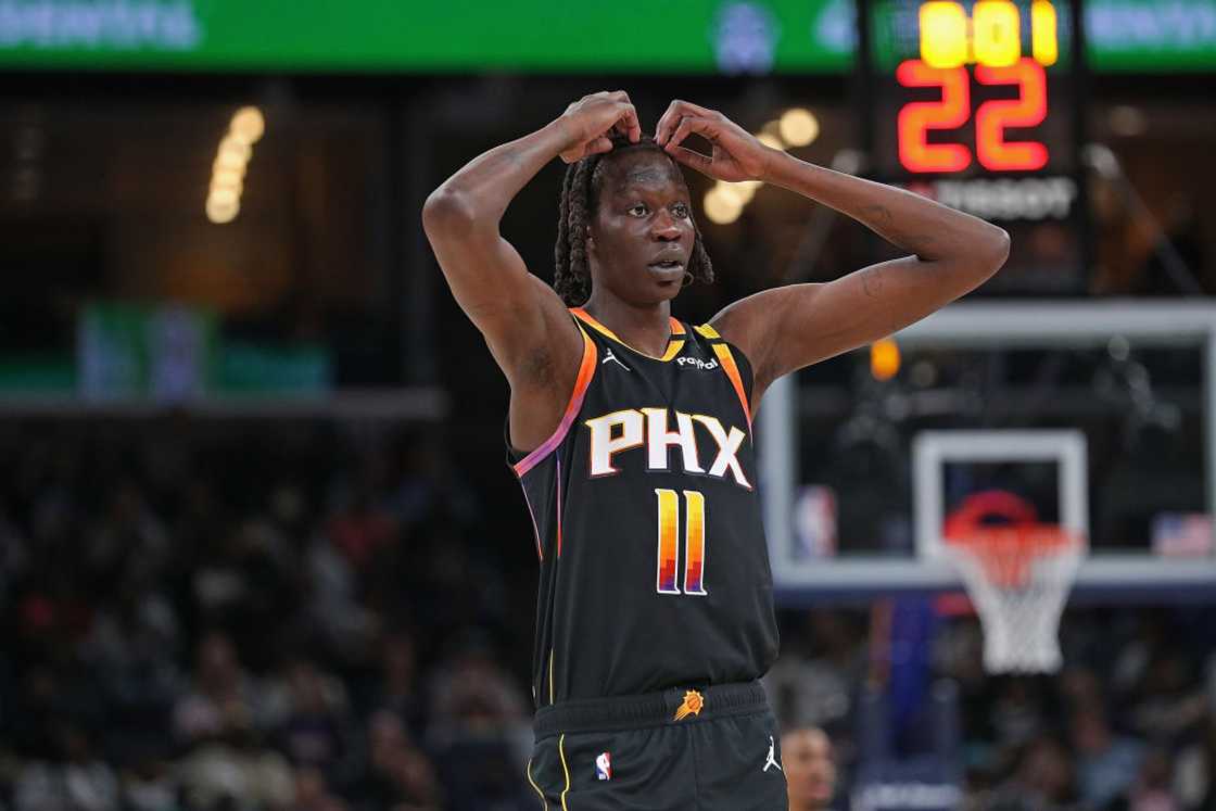 Bol Bol of the Phoenix Suns looks on as he holds his head Bol Bol of the Phoenix Suns looks on as he holds his head