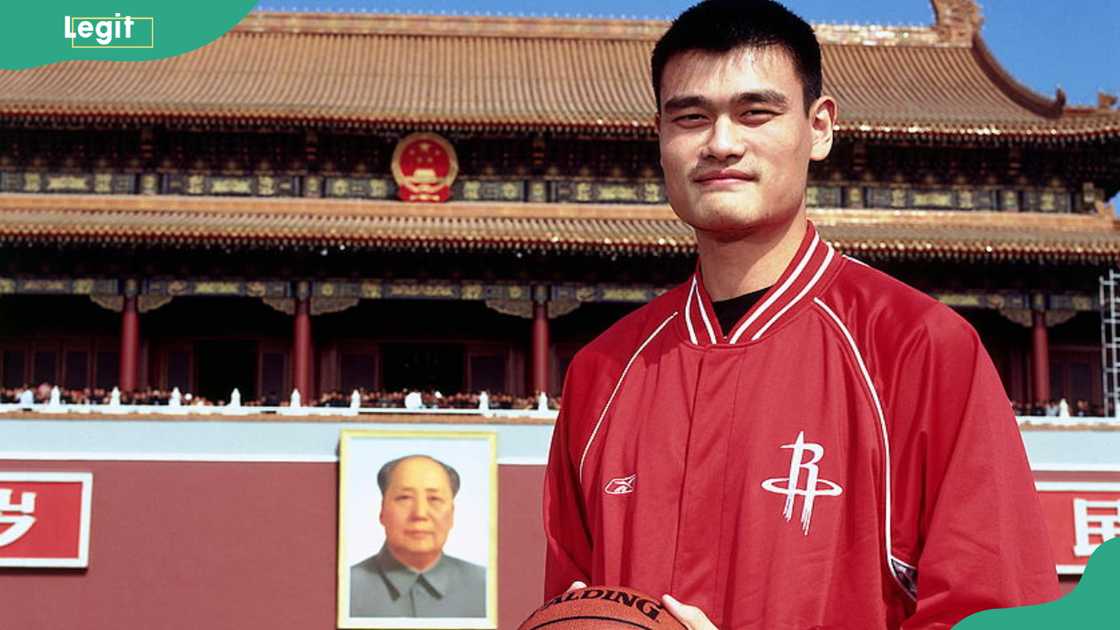 Yao Ming poses for a portrait photo in Tiananmen Square