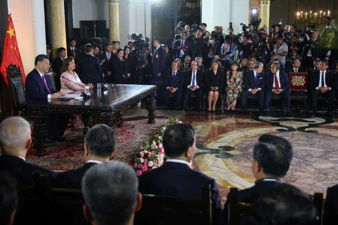 China's President Xi Jinping and Dina Boluarte of Peru oversaw the ceremony virtually from Lima