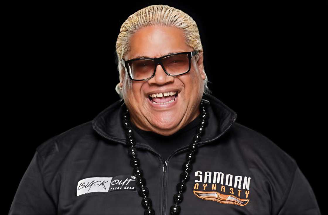 Rikishi laughs in a promotional poster Rikishi laughs in a promotional poster