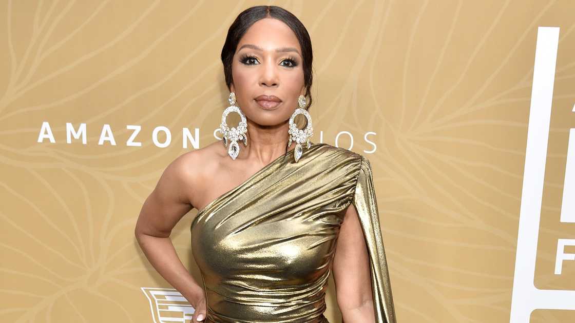 Elise Neal poses on the red carpet of the 5th American Black Film Festival at 1 Hotel, West Hollywood