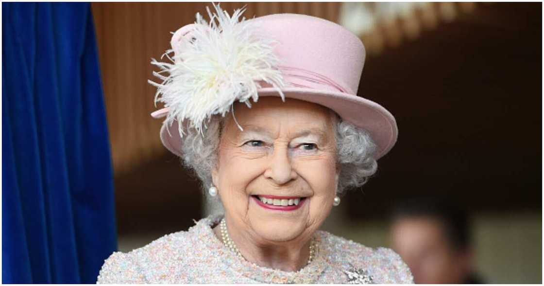 Queen Elizabeth II, England, Bishop Kukah, West Sussex on November 30, 2017 in Chichester, United Kingdom Queen Elizabeth II, England, Bishop Kukah, West Sussex on November 30, 2017 in Chichester, United Kingdom